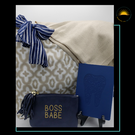 CE Essentials Gift: Includes a large zippered tote with decorative navy scarf, light tan poncho, Boss Babe small purse and debossed tooth imprinted notebook